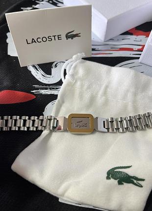Чоловічий браслет lacoste — сріблястий із золотим елементом, нержавіюча сталь, плетений дизайн