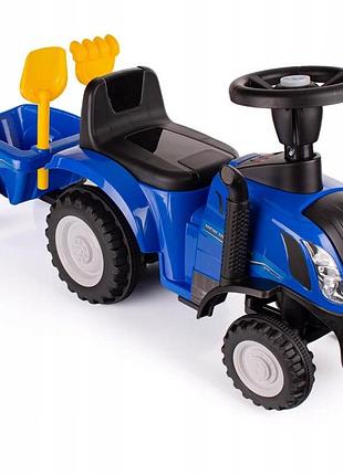 Іграшковий трактор new holland з причепом лопаткою граблями та світлом