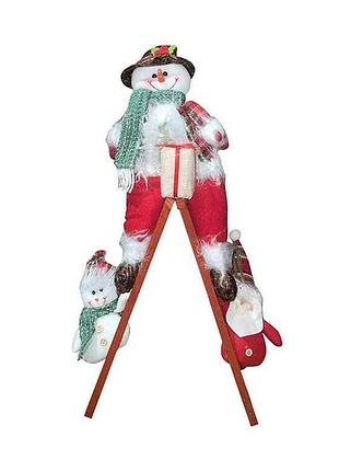 Фигура новогодняя snowman 74см на лестнице m17328 тм stenson