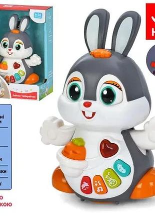 Игра he9991 ua (12шт) зайчик чеберяйчик, 19см, музыка-звук(укр), 4 стишки, 2 песни, 3 стирка