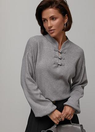В’язаний джемпер oversize з декоративними застібками