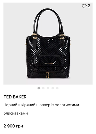 Черный кожаный шоппер с золотой фурнитурой.