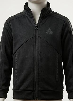 Оригінальна дитяча спортивна (зип-худі) кофта adidas із лінійки tiro у стильному повністю чорному виконанні (triple black).  
країна : таїланд.