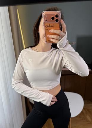 Молочна біла спортивна вкорочена кофта gymshark