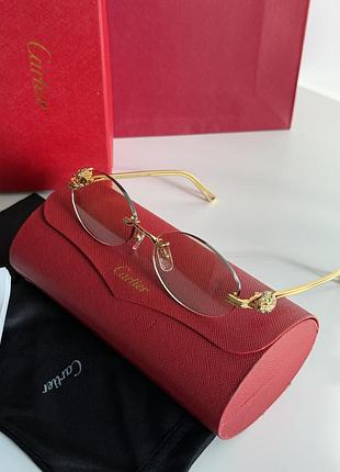 Солнцезащитные очки cartier в золотой оправе