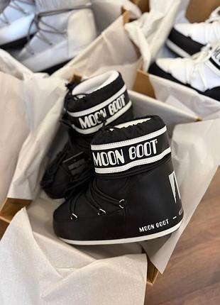 Чоботи жіночі moon boot чорні, білі 2