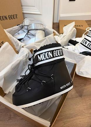Чоботи жіночі moon boot чорні, білі 6