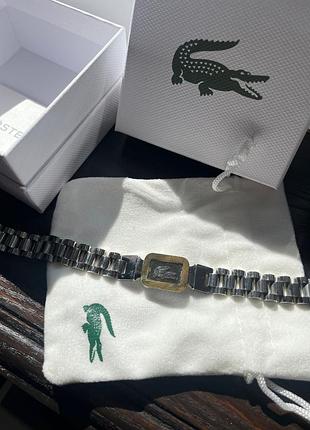 Чоловічий браслет lacoste — сріблясто-золотий, плетений, нержавіюча сталь