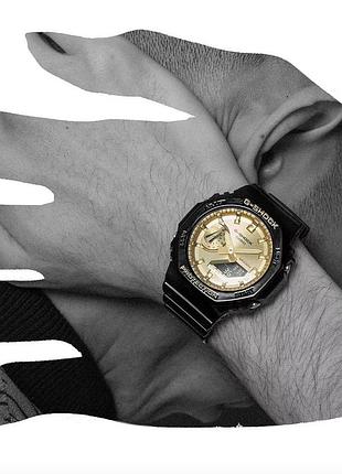 Чоловічий годинник casio g-shock ga-2100gb-1a з водозахистом 20 atm та золотистим циферблатом 6