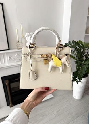 Hermes kelly 25 milk gold 4