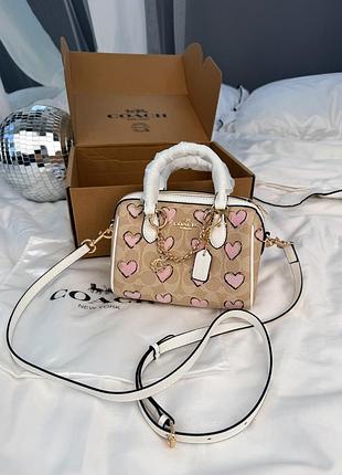 Сумка coach signature canvas heart print bag
