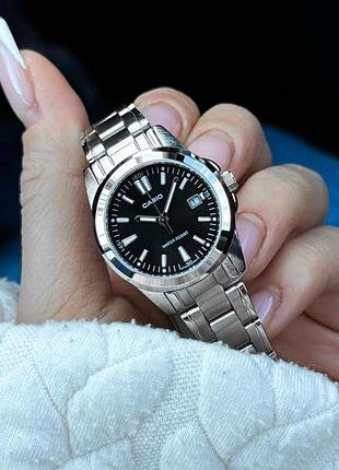 Жіночий годинник casio ltp-1215a-1a2 класичний сталевий з чорним циферблатом 2