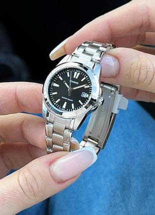 Жіночий годинник casio ltp-1215a-1a2 класичний сталевий з чорним циферблатом 4