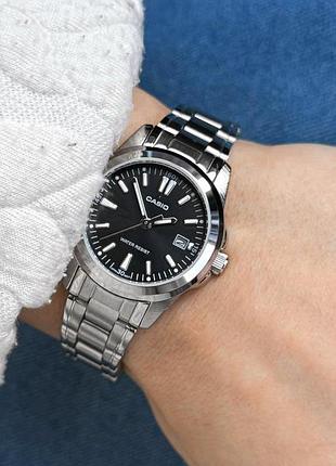Жіночий годинник casio ltp-1215a-1a2 класичний сталевий з чорним циферблатом 5