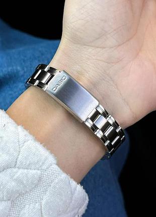 Жіночий годинник casio ltp-1215a-1a2 класичний сталевий з чорним циферблатом 6