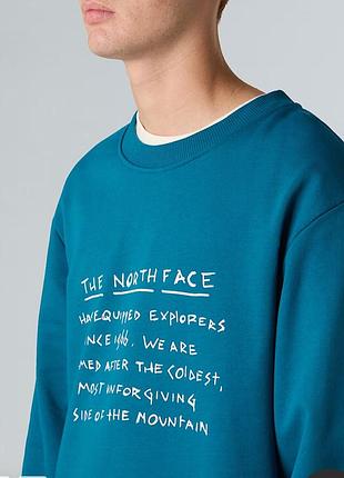 Бірюзовий чоловічий світшот the north face origin relaxed із білим написом у вигляді рукописного тексту на грудях