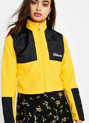 Яскрава жовта флісова куртка-кроп від ellesse, розмір 34