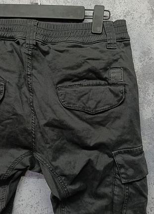 Карго штани від бренду alpha industries 4