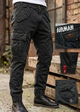 Карго штани від бренду alpha industries