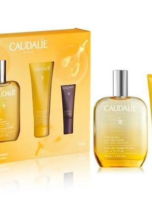 Жіночий подарунковий набір caudalie: олійка для тіла 100 мл, гель для душу 50 мл, крем під очі 5 мл