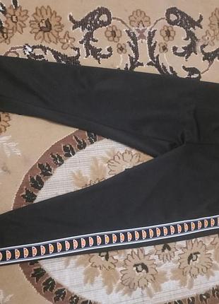 Спортивні штани жіночі ellesse чорні на лампасах