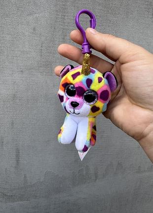 Мягкую игрушку-брелок ty beanie boo's леопард жизель (giselle) с блестящим золотистым рогом...