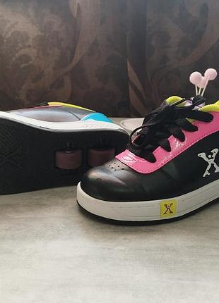 Кросівки для підлітків heelys sidewalk sports чорно-рожеві з роликами
