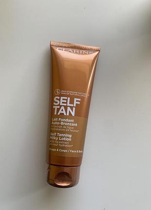 Крем автозасмага для тіла та обличчя clarins self tan milky lotion, 125 мл.