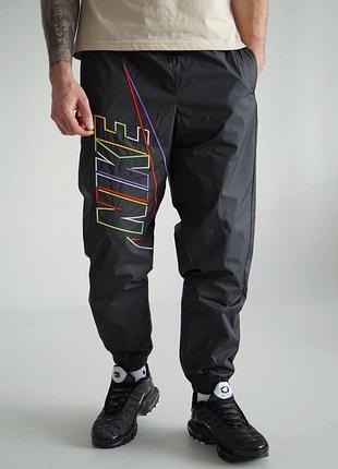 Нейлонові штани nike 4