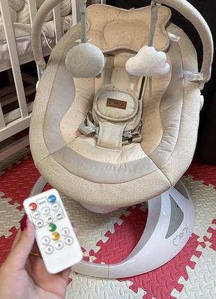 Заколисуючий центр momi pearl beige