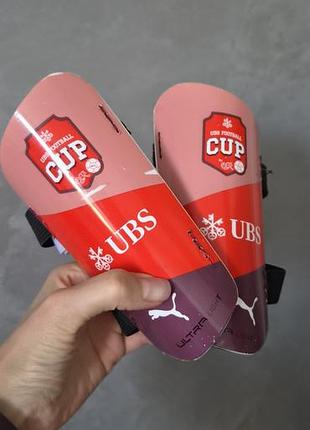 Оригінальні дитячі футбольні щитки puma з ексклюзивної лінійки ubs football cup (серія ultra light)