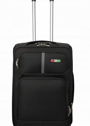 Середнього розміру подорожня валіза з матеріалу bagia premium на 4-х колесах різні кольори