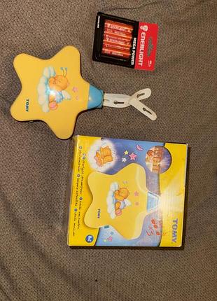 Нічний проектор «музична зірочка»
tomy + батарейки у подарунок