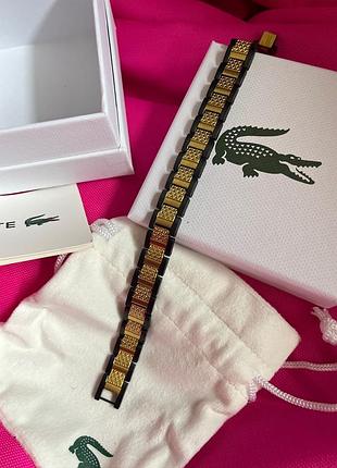 Браслет lacoste мужской - черный с золотистыми вставками, сталь 316l, регулируемый