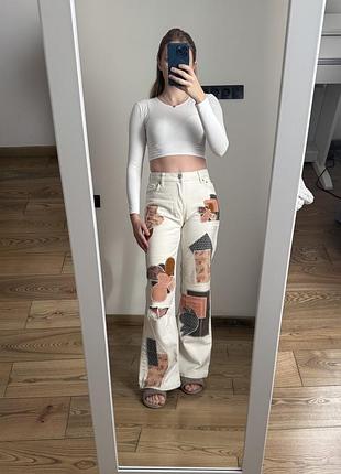 Джинси жіночі bershka кльош з аплікацією