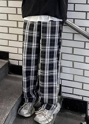 Широкие брюки в клетку unisex прямого кроя из ткани тиар повседневные молодежные 42-50 черный, 48/50