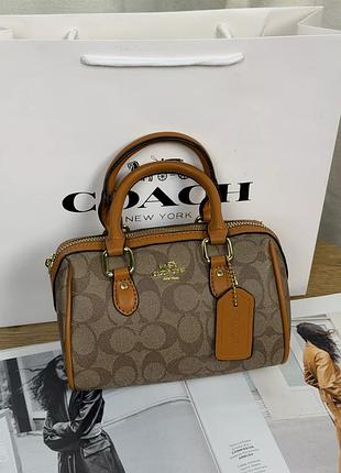 Женская сумка coach micro rowan crossbody in signature бежево-карамельный