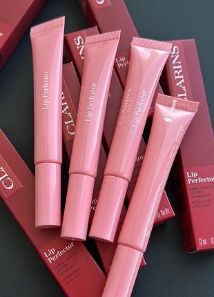 Блиск для збільшення об’єму губ clarins instant natural light lip perfector.