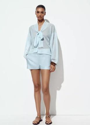 Жіноча напівпрозора блакитна блуза з бантом і широкими рукавами zara розмір с