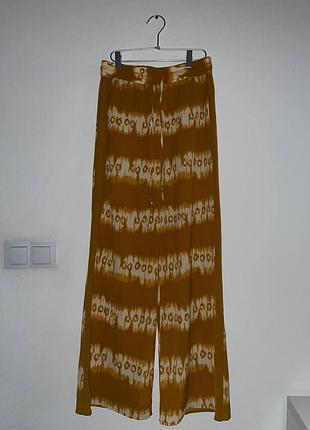 Акцентні брюки h&m