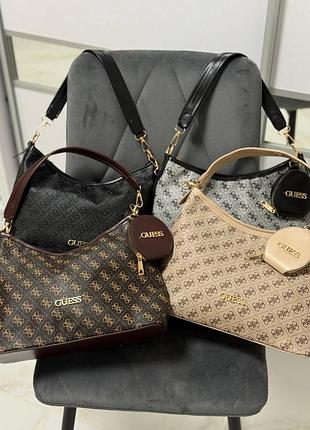 Жіноча сумка guess хобо з еко-шкіри, чорна та бежева