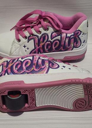 Стильні дитячі роликові кросівки бренду heelys, модель split у біло-рожевому кольорі