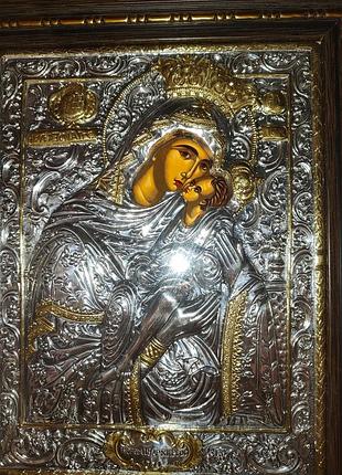 Ікона антична божої матері 1771 р. під склом, оброблена сріблом