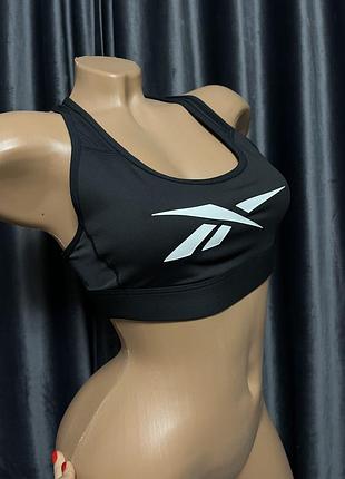 Спортивний топ від бренду reebok