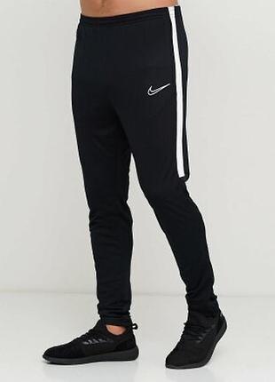 Класні спортивні штани завужені nike оригінал р.158
