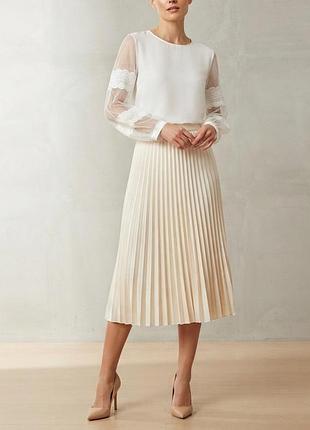 Біла блузка з мереживними рукавами сітка