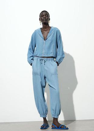Бавняні джинси з кишенями zara
