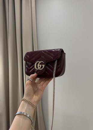 Сумки для жінок gucci gg marmont super mini shoulder bag бордовий