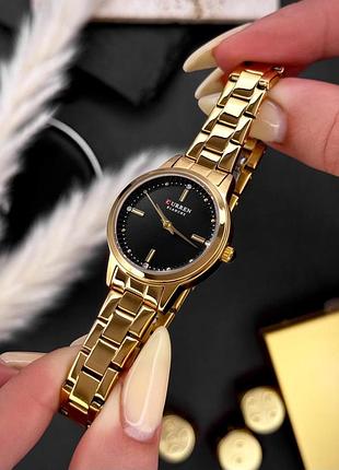 Годинники жіночі curren 9094 gold-black з нержавіючої сталі