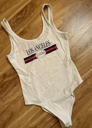 Біле боді з принтом «los angeles 1984»
